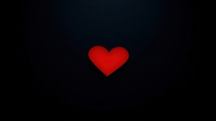 Red heart shape on a sleek black surface, radiating warmth and emotion with a minimalist aesthetic.