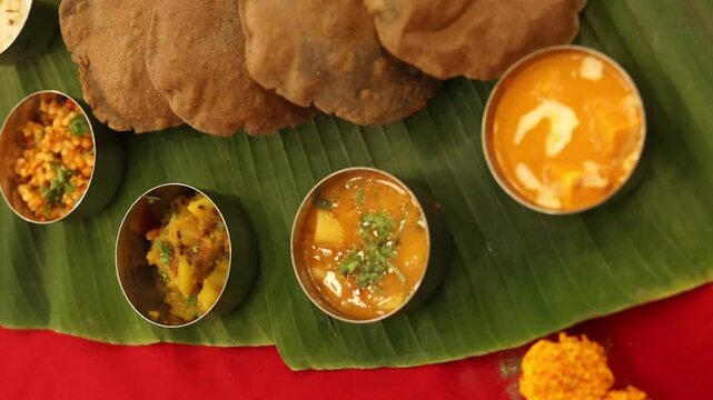 Navratri Upwas Thali  Fasting food platter on banana leaf background