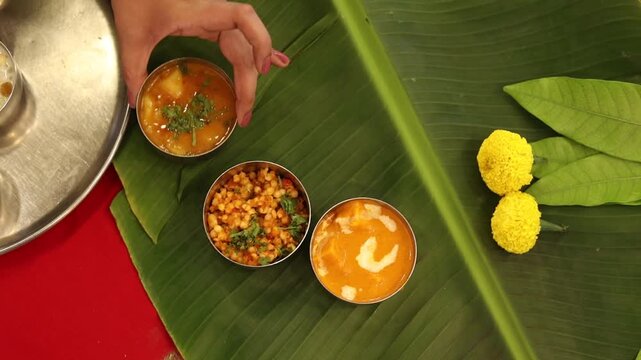 Navratri Upwas Thali  Fasting food platter on banana leaf background