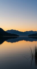 Fototapeta premium A Calm and Serene Evening Scene with a Lake and Mountains