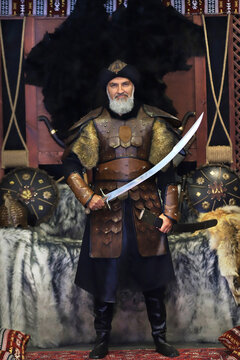 First Ottoman soldier uniforms and weapons. 
Traditional old Turkish items in the background.