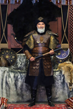 First Ottoman soldier uniforms and weapons. 
Traditional old Turkish items in the background.