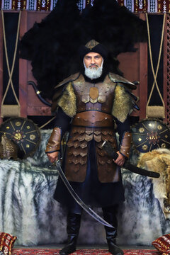 First Ottoman soldier uniforms and weapons. 
Traditional old Turkish items in the background.