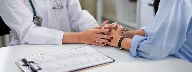 female doctor hold hand of woman patient give comfort, express health care sympathy, medical help...