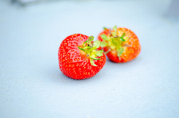 Two Ripe and Juicy Red Strawberries