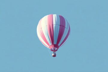 Fototapeta premium A pink and white striped hot air balloon floats in the clear blue sky.