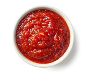 Obraz premium Small white bowl filled with chunky tomato sauce