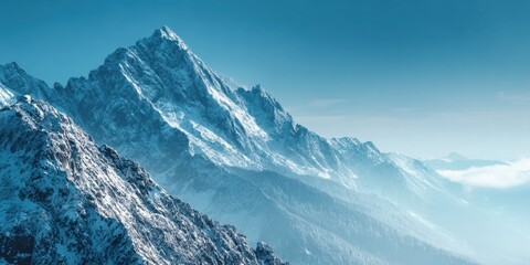 Majestic snow-capped mountain peak and serene blue sky, capturing nature's beauty