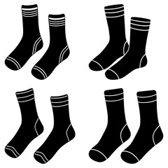 Four pairs of black socks with white stripes are arranged on a white background in the image shown