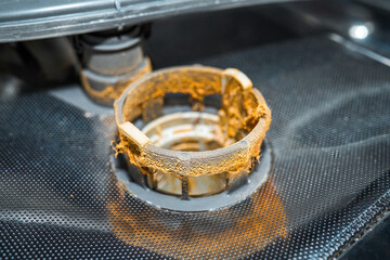 Food waste and grease in dishwasher filter