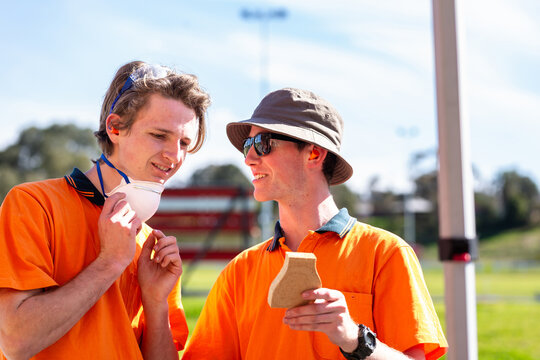 Two young Aussie blokes laughing together during trade apprentice traineeship course