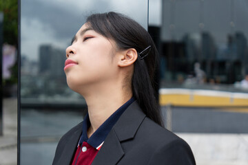 Asian business woman on the top roof
