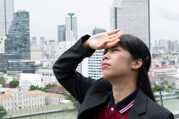 Asian business woman on the top roof