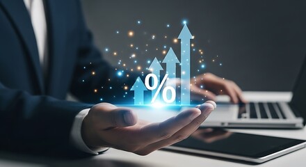 Businessman holding glowing percentage sign and upward arrow graph with digital elements