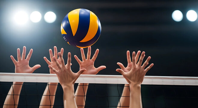 Volleyball players reaching for the ball at the net