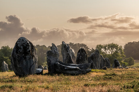 Carnac megalithic stone alignments in Brittany France at sunrise