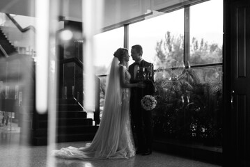meeting of the bride and groom in the hotel