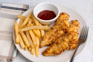 chicken tenders with  fries
