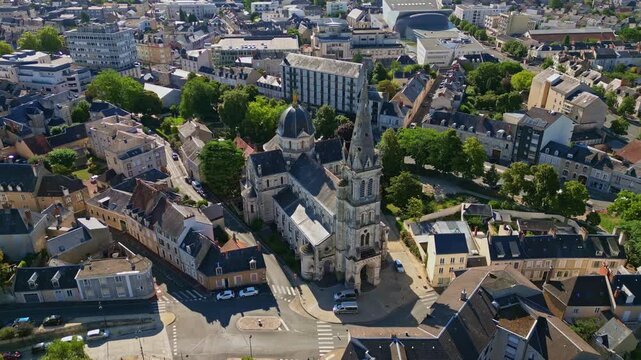 Backward drone fly from the Notre-Dame of Chateauroux parish church aka &Eacute;glise Notre-Dame de Chateauroux, Centre-Val de Loire, France.