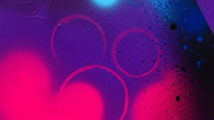 Abstract purple and pink background with circular lights and texture
