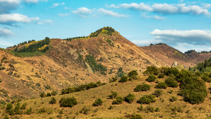 mountain landscape with blue sky and clouds