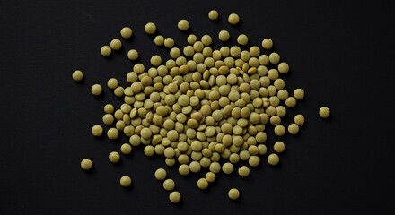 Green lentils on black background food photography for packaging and culinary websites