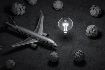 A glowing light bulb on a crumpled paper with more crumpled papers around it represents leadership, ideas, planning, teamwork, or problem-solving meetings.