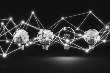 A lit light bulb and paper clump light bulb: The lit bulb represents thinking, leadership, success, ideas, and inspiration.