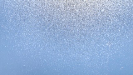 smooth light blue textured surface with subtle grainy pattern creating abstract minimalist background ideal for wallpaper or banner design