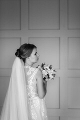 bride in lavender fluffy wedding dress in bright studio