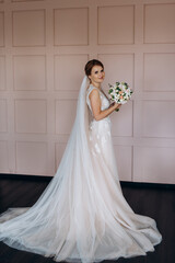 bride in lavender fluffy wedding dress in bright studio