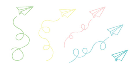 Set of handdrawn crayon paper airplane doodles. Simple and whimsical vector elements representing travel, communication, or childhood. Chalk drawing paper planes with curving flight path set. © LENNAMATS