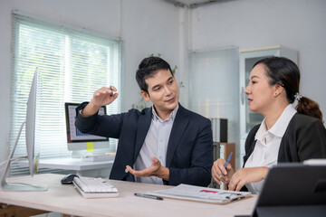 Business people discussing work in office meeting room