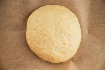 Dough raw cooking yeast, flour, water tasty snack fresh delicious gourmet food background on the table rustic food top view copy space