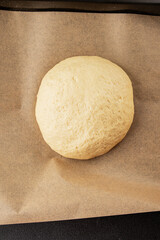 Dough raw cooking yeast, flour, water tasty snack fresh delicious gourmet food background on the table rustic food top view copy space