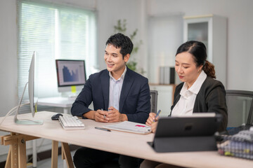 Business people working and discussing business strategy together in modern office