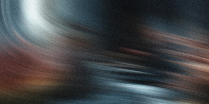 Abstract swirling streaks of light and color create a dynamic and energetic motion blur effect, evoking a sense of speed and movement through a textured, grainy atmosphere