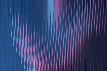 Abstract blue and pink vertical lines create a textured, futuristic, and dynamic background pattern