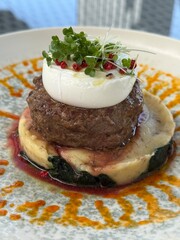 Steak with Truffle Mashed Potatoes and Poached Egg A tender and juicy steak seared to a radiant golden brown pairs perfectly with a fragrant and slightly mushroomy potato pillow poached egg