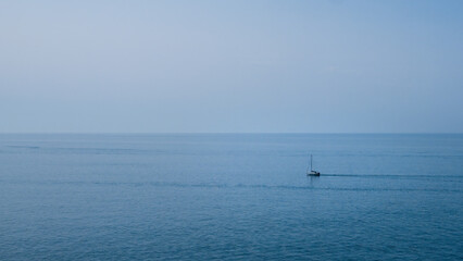 Single sailboat on calm Atlantic Ocean off Portugal