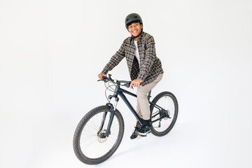 Naklejka premium black teen boy drive bike on studio white