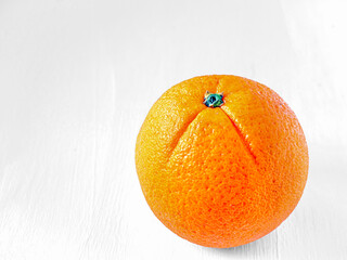 Orange fruit on wooden white background, Close-up