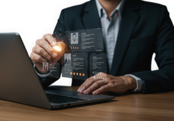 Businessman interacting with digital data on a laptop screen