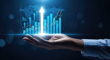 A hand holds a glowing digital graph displaying upward financial growth with a