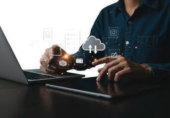 Businessman interacting with digital cloud computing and data security icons