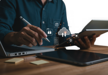 Businessman using digital devices for cloud computing and data security