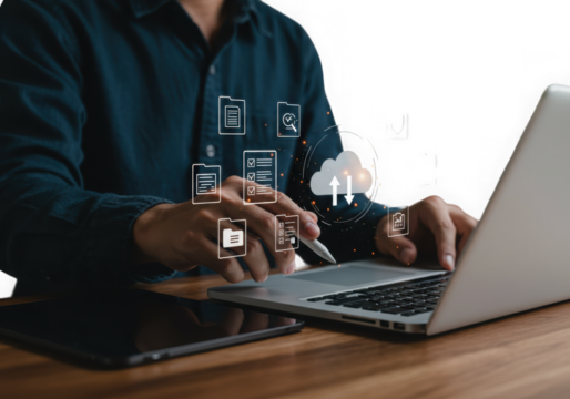 Person using laptop with digital cloud and data icons - Powered by Adobe