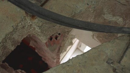 This visual demonstrates significant plumbing issues along with serious wall damage that needs urgent attention