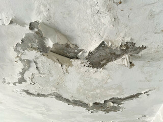 Flat Roof leaked is cause to stain ceiling of building.