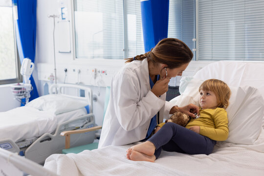 Healthcare Provider Engages with Child Patient